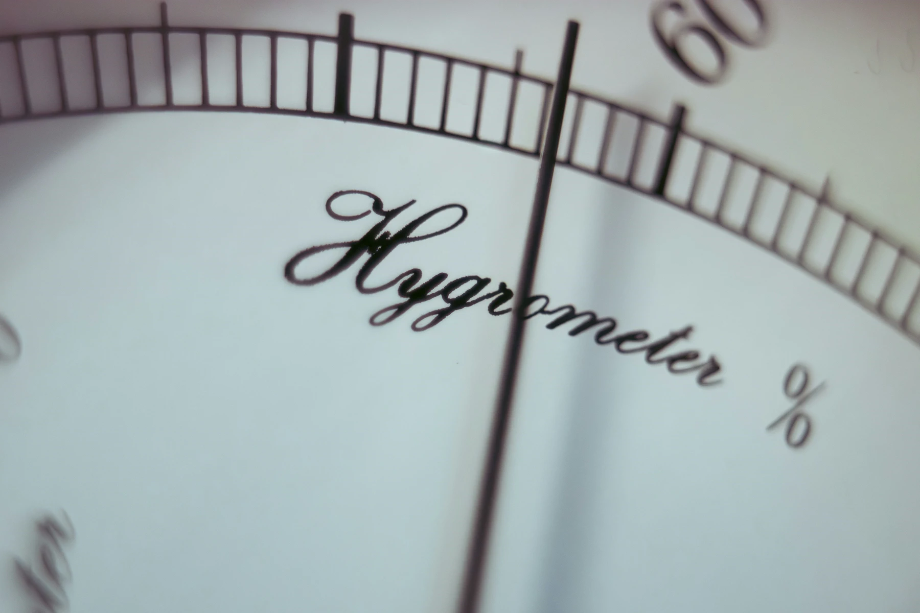 A close view of an analogue hygrometer used to monitor indoor humidity
